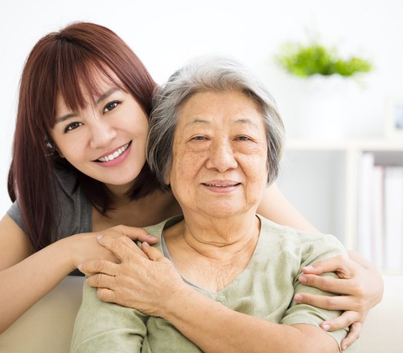 Grandmother,And,Granddaughter.,Young,Woman,Carefully,Takes,Care,Of,Old